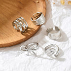 Irregular Metal Niche Lava Ring With Smooth, Polished Lines And An Open Design