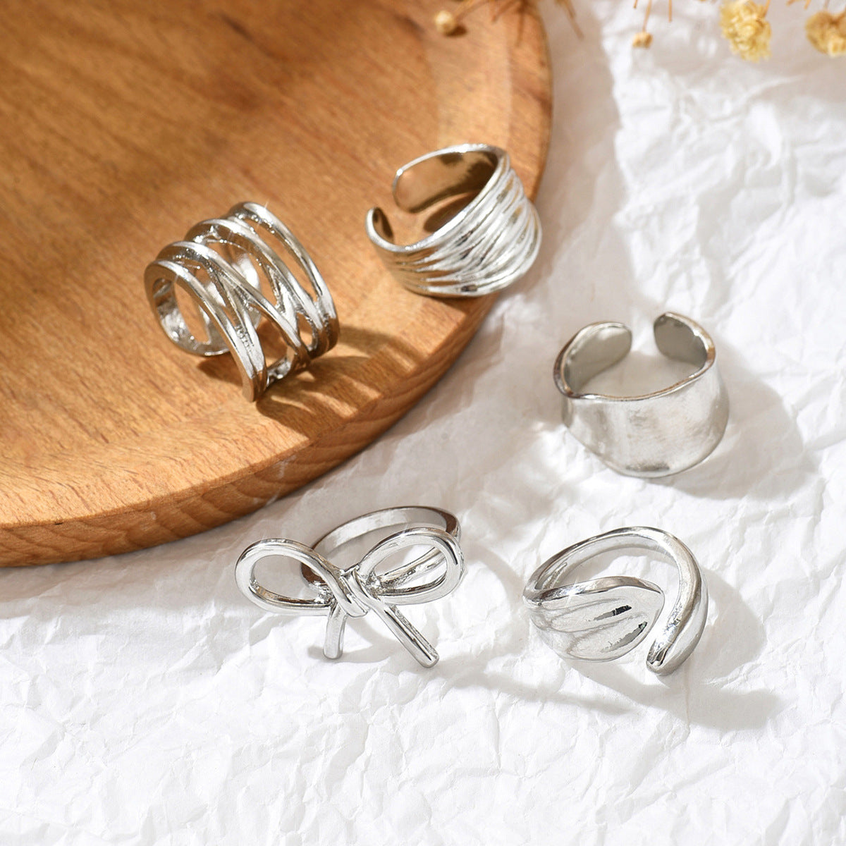 Irregular Metal Niche Lava Ring With Smooth, Polished Lines And An Open Design